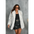 Woman in a white faux fur coat.