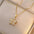 TwirlBauhinia Zircon Necklace - White Bauhinia