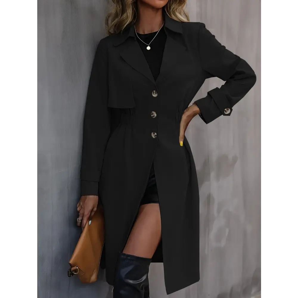 Black trench coat with thigh-high boots.
