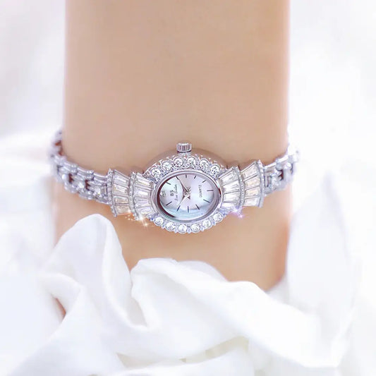 Vintage Chic Ladies Watch with Roman Numerals and Intricate Detailing