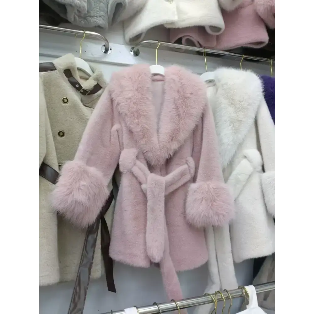 Pink faux fur coat with a tie.