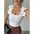 White ribbed tank top with floral shoulder embellishments.