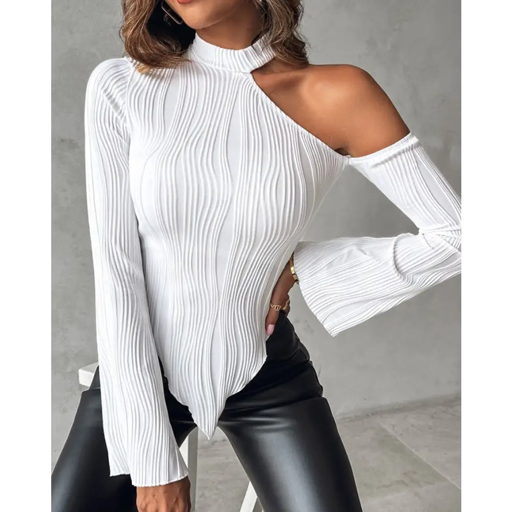 White textured asymmetrical long-sleeve top.