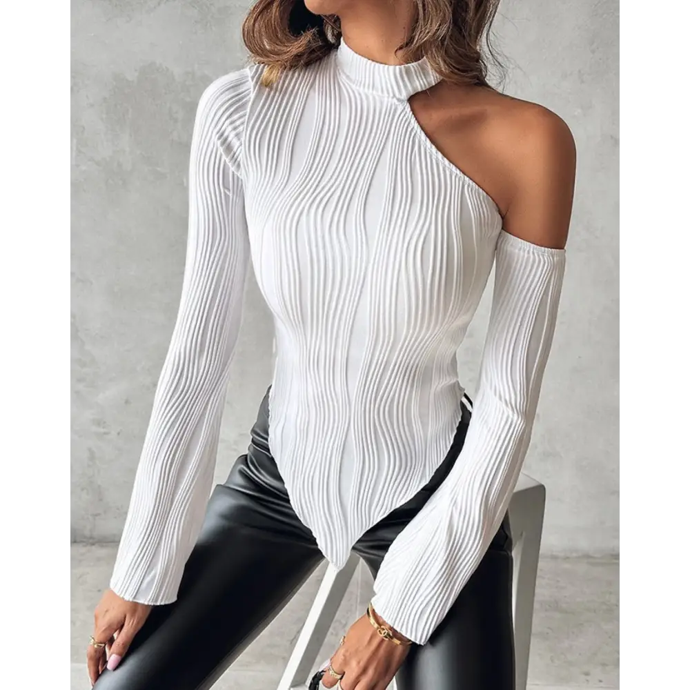 White textured one-shoulder long-sleeve top.