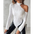 White textured one-shoulder long-sleeve top.