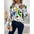 White long-sleeved shirt with abstract face design.