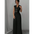 Black sleeveless vest and pleated pants outfit.