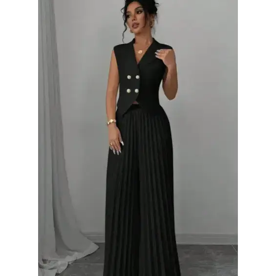 Black sleeveless vest and pleated pants outfit.