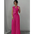 Woman in a pink vest and pleated pants.