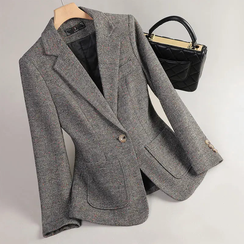 Gray herringbone blazer.