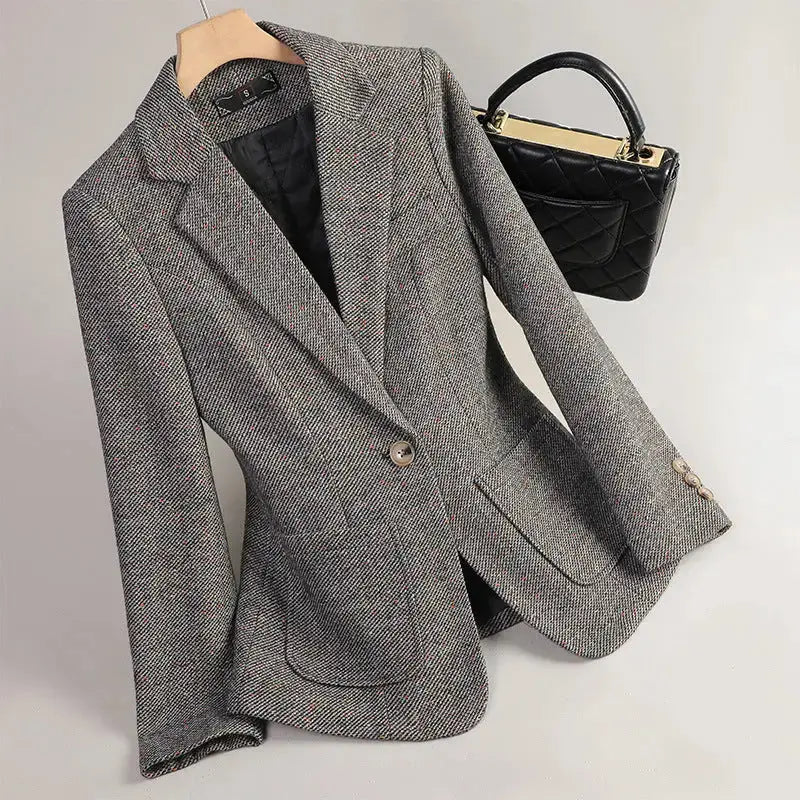 Gray herringbone blazer.