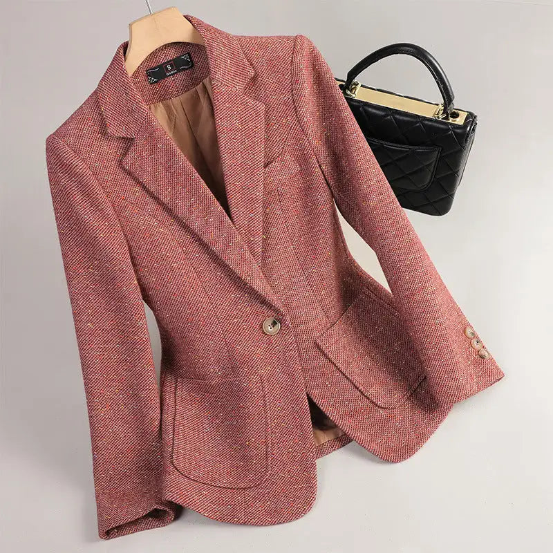 Rose-colored tweed blazer.