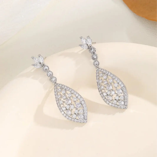 ZirconGlow Hollow Earrings: Trendy Chic Design