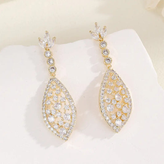 ZirconGlow Hollow Earrings: Trendy Chic Design